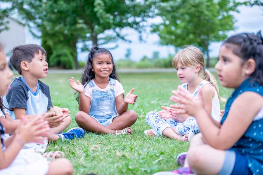 Kids playing in a circle