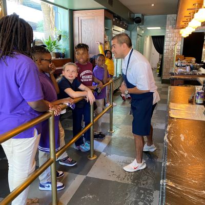 Kids are greeted by Chef Michael