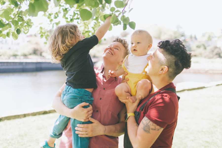 Happy family with kids laughing