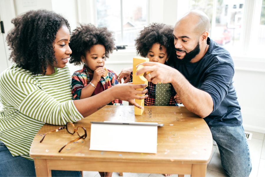 RDM-900×600 Family plays a game together