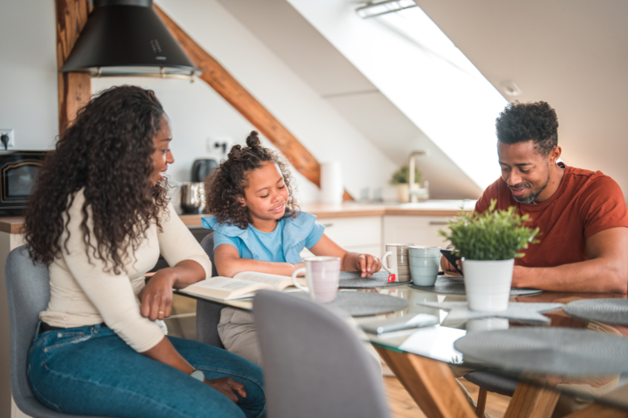 Self-Awareness-900×600 A family sits around the kitchen table together