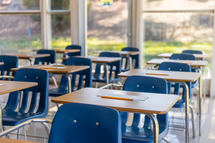 Empty school desk chairs